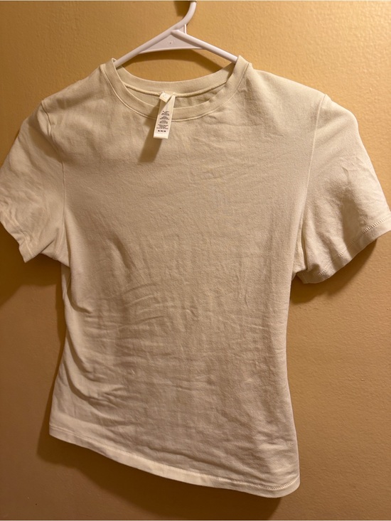 SKIMS Tops - Skims Classic Crewneck Women's Tee - Cream with a small flaw in the back